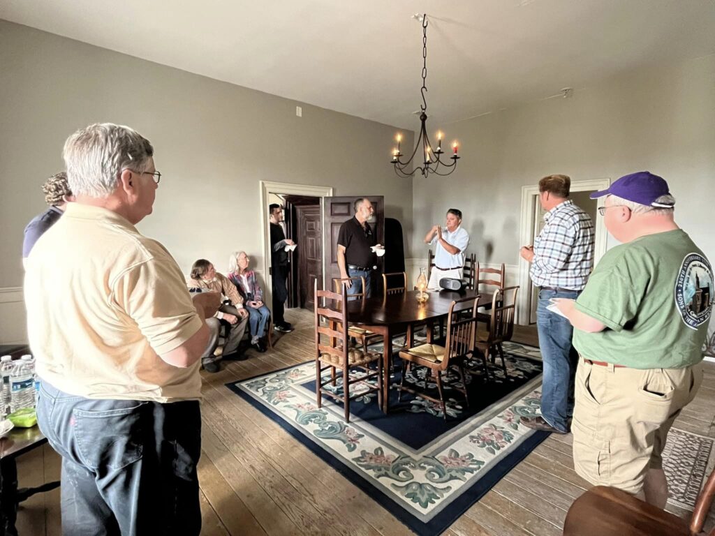 Wade Sokolosky speaks to group in the dining room of Oak Grove Plantation
